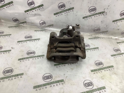 Суппорт задний правый 0318-201 Volkswagen Passat B7 USA  5K0615424 