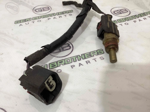 Датчик температуры масла двигателя 4411-147 Jeep Patriot  5033314AA 